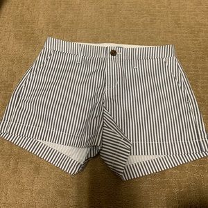 Blue & white striped shorts.